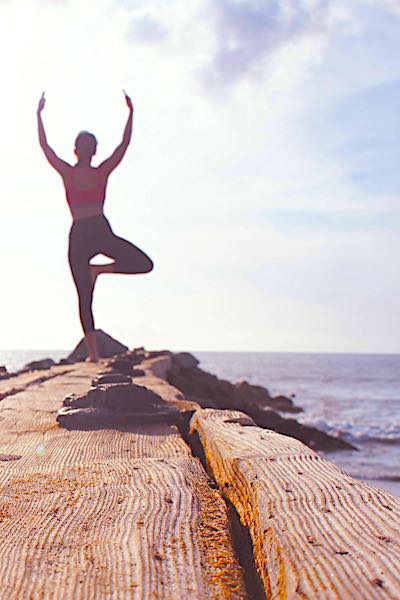 anxiety microbes calm beach yoga toward sun