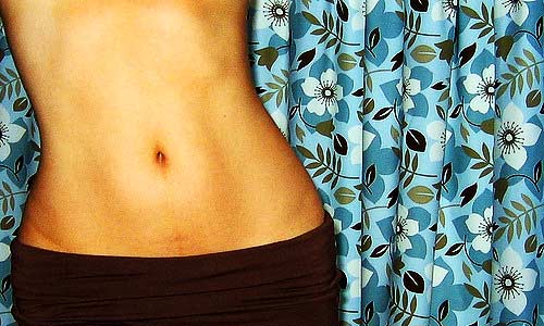 hips belly hourglass waist on blue floral background