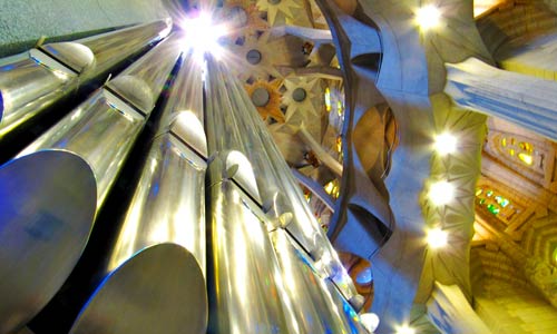 silver organ pipes sagrada familia church with roof and pillars