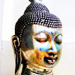 silver buddha head statue