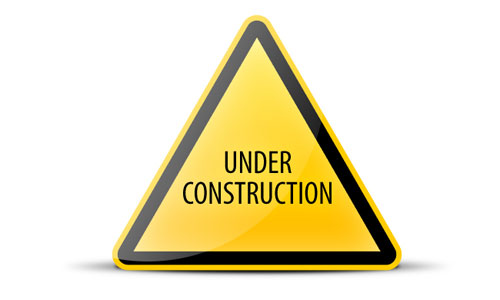 under construction yellow black triangle icon