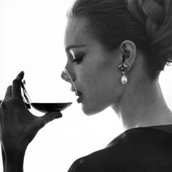 vogue model drinking wine 1962 black and white